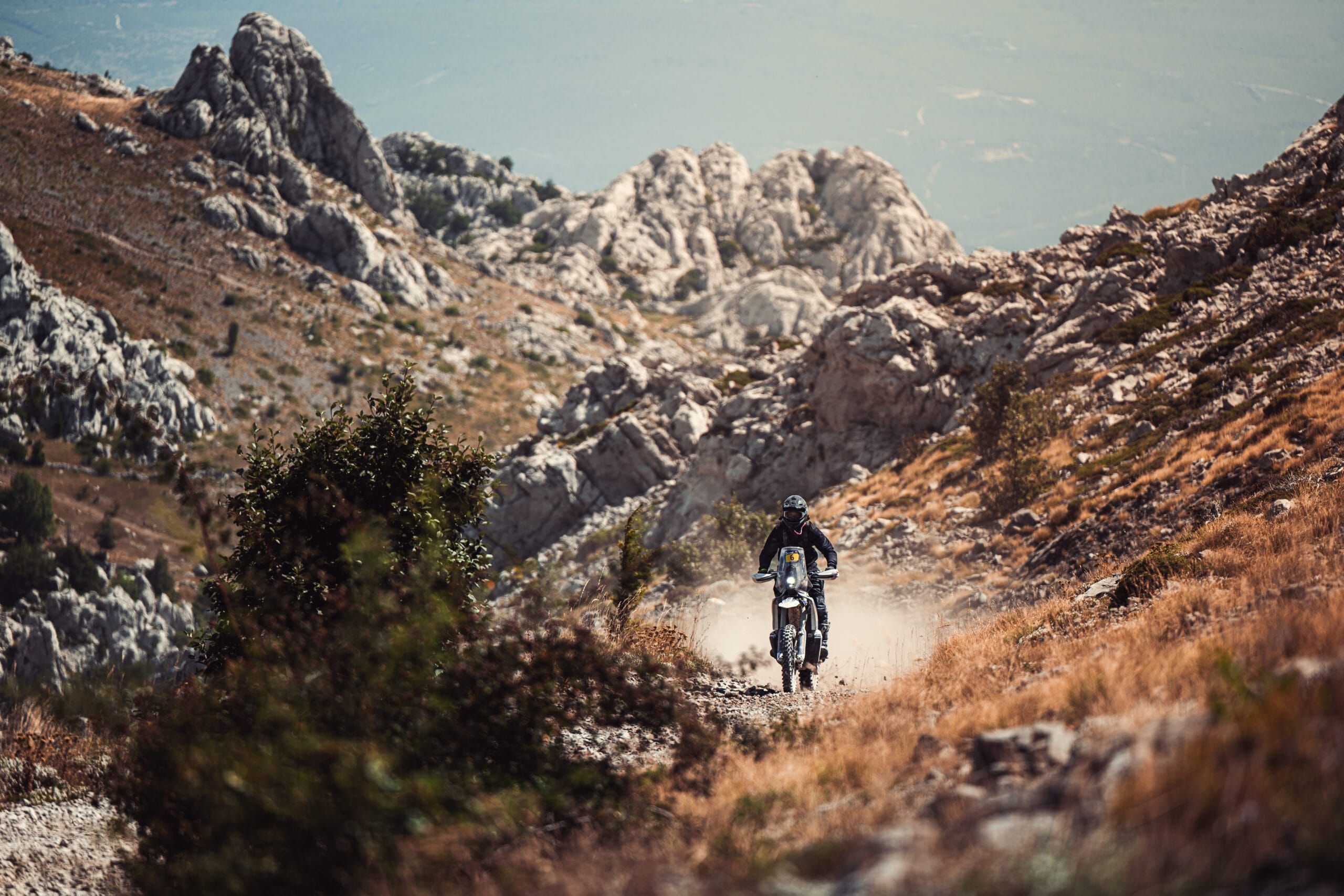 Motorcycle Rally Riders in the Dinaric Mountains plains